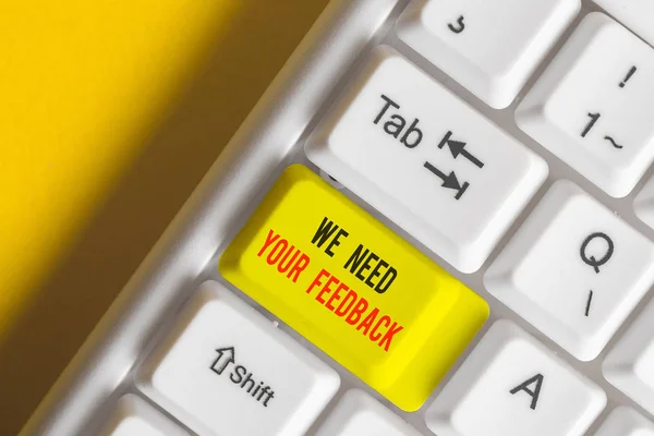 Word writing text We Need Your Feedback. Business concept for criticism given to say can be done improvement White pc keyboard with empty note paper above white background key copy space.