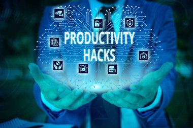Word writing text Productivity Hacks. Business concept for tricks that you get more done in the same amount of time Male human wear formal work suit presenting presentation using smart device.