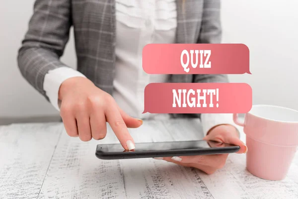 Handwriting text writing Quiz Night. Concept meaning evening test knowledge competition between individuals Business concept with mobile phone in the hand.