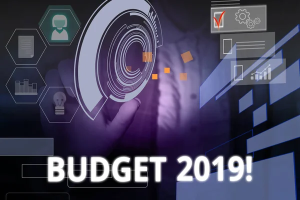 Writing note showing Budget 2019. Business photo showcasing the estimate of income and expenditure for current year Woman wear formal work suit presenting presentation using smart device. — Stock Photo, Image