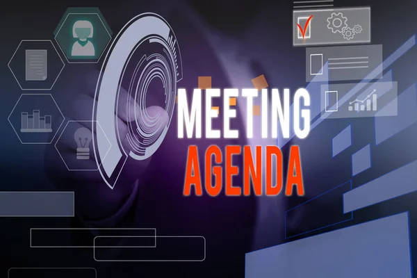 Word writing text Meeting Agenda. Business concept for items that participants hope to accomplish at a meeting Male human wear formal work suit presenting presentation using smart device.