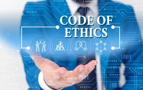 Writing note showing Code Of Ethics. Business photo showcasing basic guide for professional conduct and imposes duties Male wear formal work suit presenting presentation smart device. — Stock Photo, Image