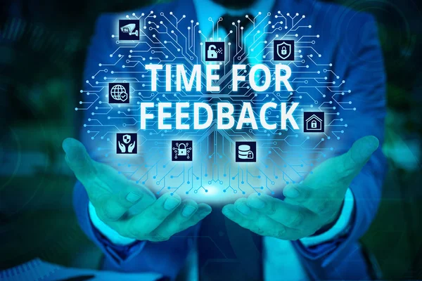 Word writing text Time For Feedback. Business concept for information about reactions to a product or services Male human wear formal work suit presenting presentation using smart device.