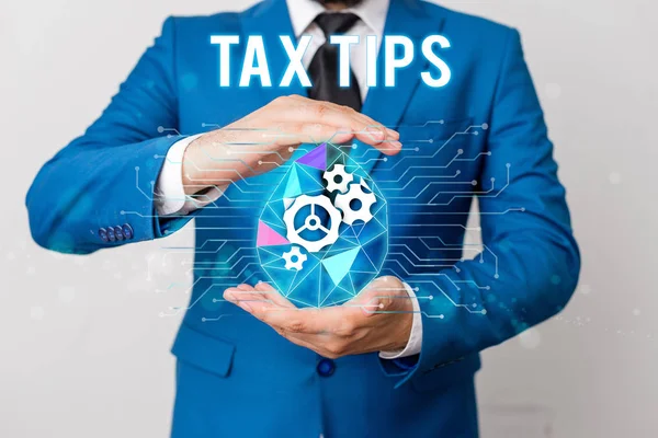 Handskrifts text skriva skatt tips. Begrepp som innebär obligatoriskt bidrag till statens inkomster tas ut av regeringen man netto växlar bubbla händer kostym maskiner grejer kontor teknologisk enhet. — Stockfoto