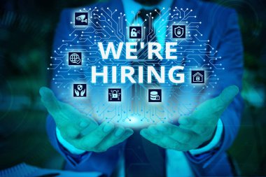 Kelime yazma metni Biz İşe konum. Başvuruların gözden geçirilmesi ve adayların bulunması için iş konsepti Erkek insan giyim resmi iş elbisesi sunan sunum akıllı cihaz kullanarak.