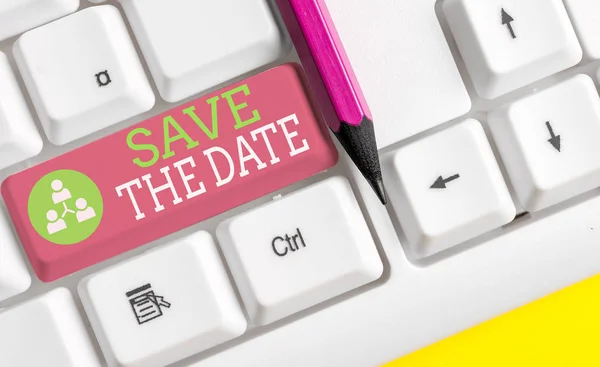 Text sign showing Save The Date question. Conceptual photo asking someone to remember specific day or time White pc keyboard with empty note paper above white background key copy space. — Stock Photo, Image