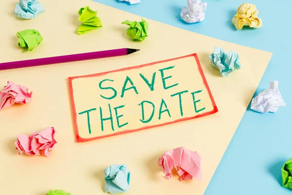 Writing note showing Save The Date question. Business photo showcasing asking someone to remember specific day or time Colored crumpled papers empty reminder blue yellow clothespin. — Stock Photo, Image