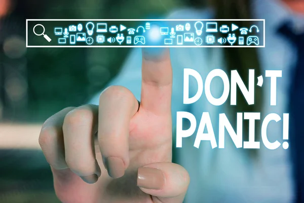 Text sign showing Don T Panic. Conceptual photo suddenly feel so worried or frightened that you can not behave Woman wear formal work suit presenting presentation using smart device.