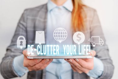 Handwriting text writing De Clutter Your Life. Concept meaning remove unnecessary items from untidy or overcrowded places Modern technology tech loock Lady front presenting hands blue glow copy space. clipart