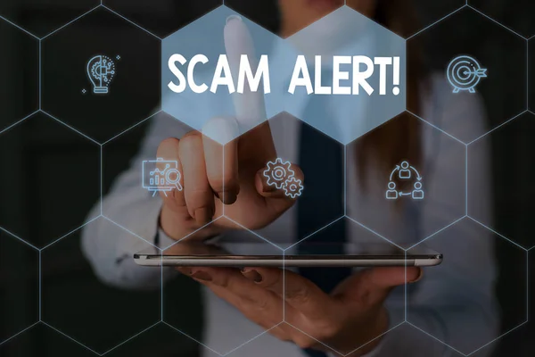 Writing note showing Scam Alert. Business photo showcasing fraudulently obtain money from victim by persuading him Woman wear formal work suit presenting presentation using smart device. — Stock Photo, Image