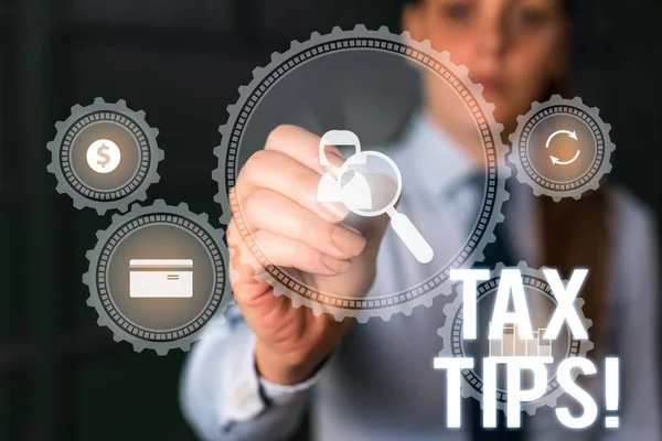Word writing text Tax Tips. Business concept for compulsory contribution to state revenue levied by government Woman wear formal work suit presenting presentation using smart device. — Stock Photo, Image
