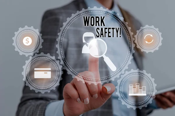 Writing note showing Work Safety. Business photo showcasing policies and procedures in place to ensure health of employees Woman wear formal work suit presenting presentation using smart device. — Stock Fotó