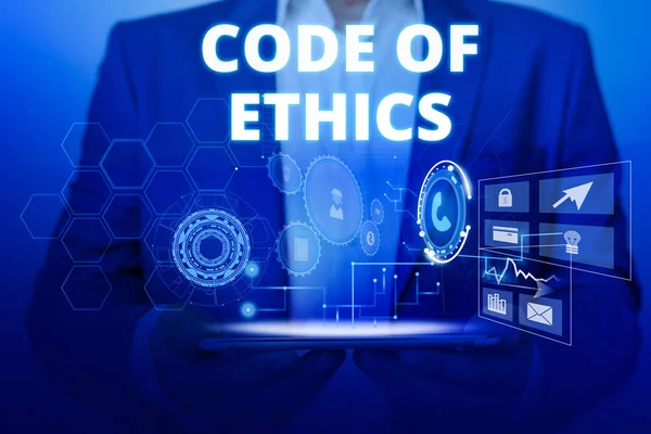 Text sign showing Code Of Ethics. Conceptual photo basic guide for professional conduct and imposes duties Male human wear formal work suit presenting presentation using smart device. — Stock Photo, Image