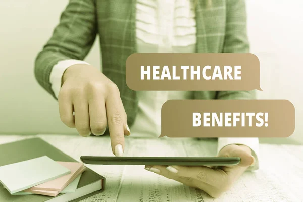 Writing note showing Healthcare Benefits. Business photo showcasing monthly fair market valueprovided to Employee dependents Business concept with mobile phone in the hand. — Stockfoto