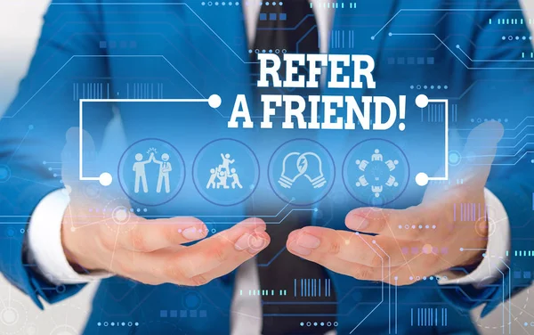 Conceptual hand writing showing Refer A Friend. Business photo showcasing direct someone to another or send him something like gift Male wear formal suit presenting presentation smart device. — Stock Photo, Image