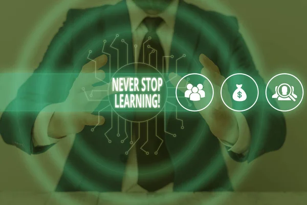 Text sign showing Never Stop Learning. Conceptual photo keep on studying gaining new knowledge or materials Male human wear formal work suit presenting presentation using smart device. — Stock Photo, Image