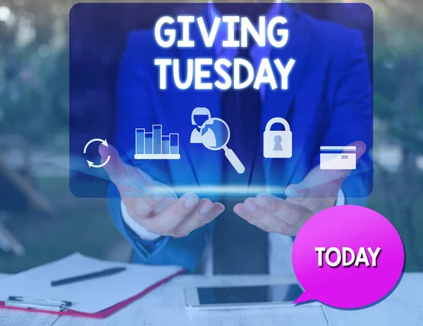 Text sign showing Giving Tuesday. Conceptual photo international day of charitable giving Hashtag activism man icons smartphone speech bubble office supplies technological device. — 图库照片