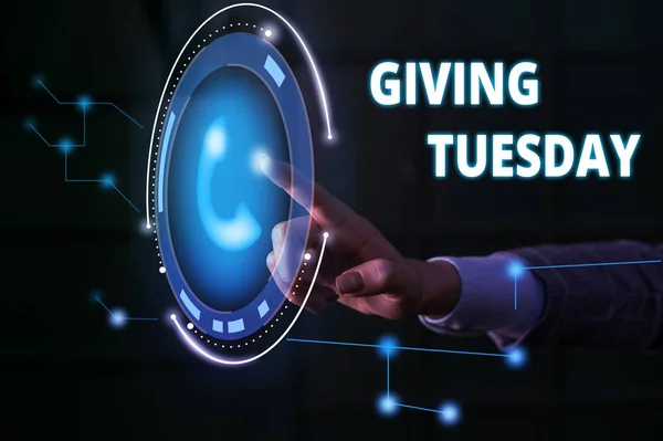 Handwriting text Giving Tuesday. Concept meaning international day of charitable giving Hashtag activism Lady presenting hand blue glow futuristic modern technology tech look contact.