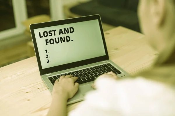 Conceptual hand writing showing Lost And Found. Business photo text a place where lost items are stored until they reclaimed woman with laptop smartphone and office supplies technology. — Stock Photo, Image