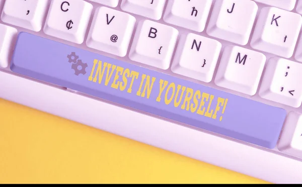 Text sign showing Invest In Yourself. Conceptual photo nvesting in a coach or a training to learn new things White pc keyboard with empty note paper above white background key copy space.