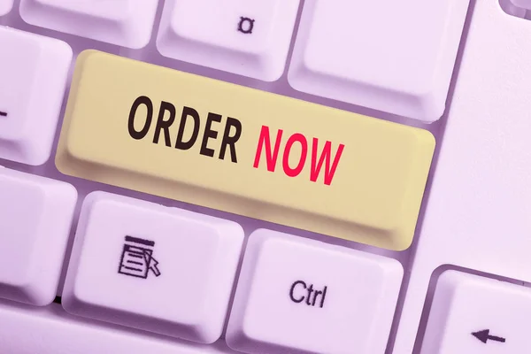 Text sign showing Order Now. Conceptual photo the activity of asking for goods or services from a company White pc keyboard with empty note paper above white background key copy space. — Stock Photo, Image