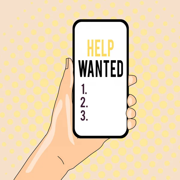Conceptual hand writing showing Help Wanted. Business photo text An ad in the paper an employer places to find a new employee Closeup of Smartphone Device Held in Hand and Text Space.