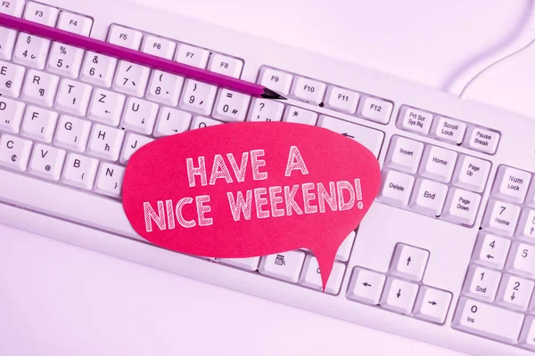 Text sign showing Have A Nice Weekend. Conceptual photo wishing someone that something nice happen holiday Empty copy space red note paper bubble above pc keyboard for text message.