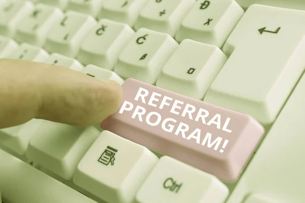 Handwriting text Referral Program. Concept meaning internal recruitment method employed by organizations White pc keyboard with empty note paper above white background key copy space.