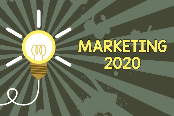 Word zapisuje text marketing 2020. Podnikatelský koncept pro komerční trendy pro 2020 nový rok propagační akce Velká idea žárovka. Úspěšná obracení myšlenka inovace vynálezů. Spuštění. — Stock fotografie