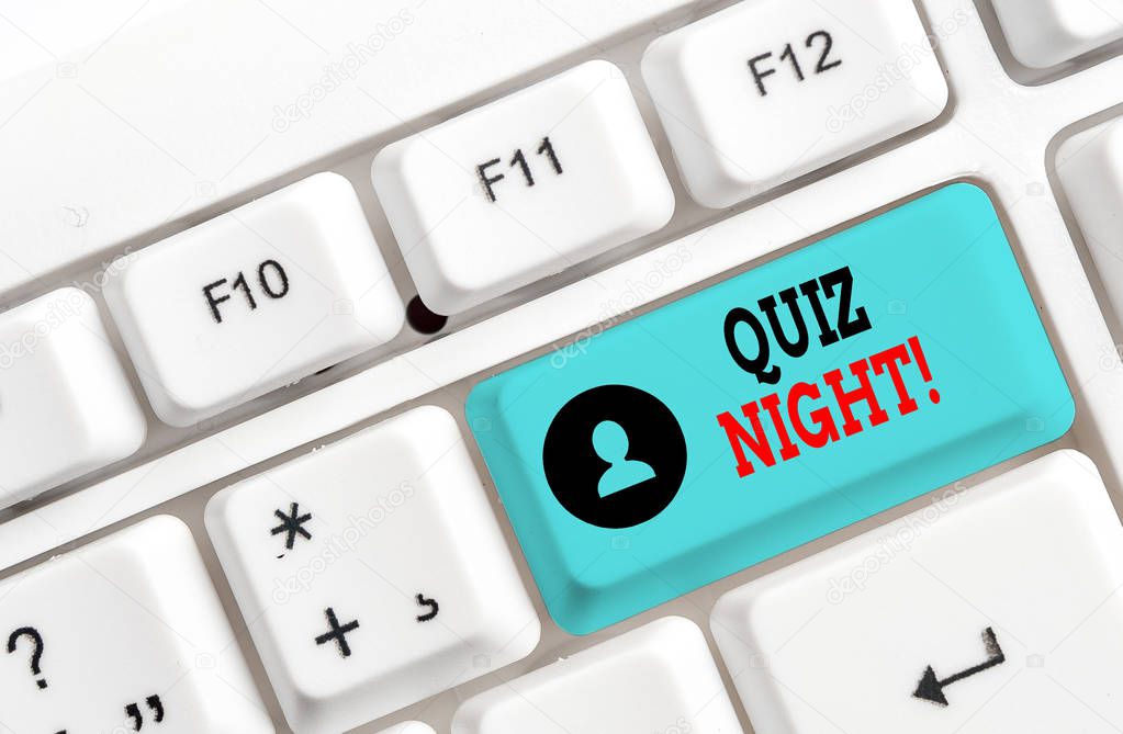 Conceptual hand writing showing Quiz Night. Business photo showcasing evening test knowledge competition between individuals White pc keyboard with note paper above the white background.