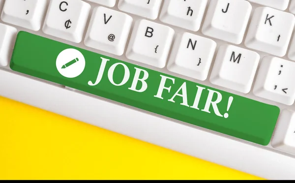 Writing note showing Job Fair. Business photo showcasing event in which employers recruiters give information to employees White pc keyboard with note paper above the white background.