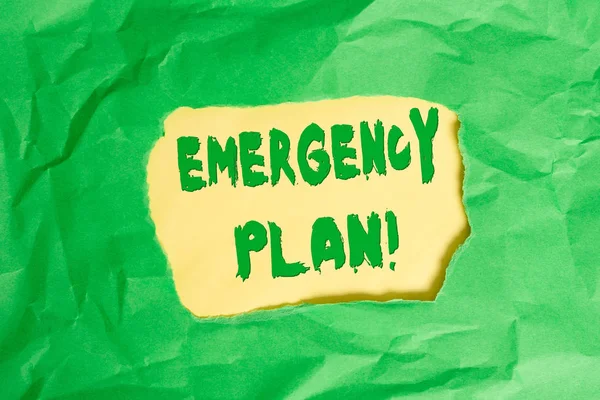 Writing note showing Emergency Plan. Business photo showcasing actions developed to mitigate damage of potential events Green crumpled colored paper sheet torn colorful background. — Stock Photo, Image