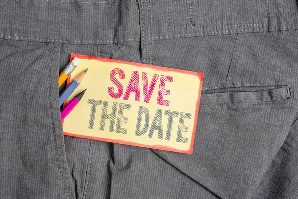 Conceptual hand writing showing Save The Date question. Business photo showcasing asking someone to remember specific day or time Writing equipment and yellow notepaper in pocket of trousers. — Stock Photo, Image