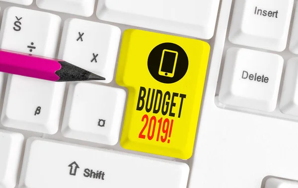 Word writing text Budget 2019. Business concept for the estimate of income and expenditure for current year White pc keyboard with empty note paper above white background key copy space. — Stock Photo, Image