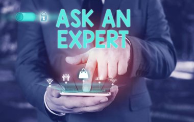 Bir Uzmansa Sor'u gösteren kavramsal el yazısı. İş fotoğraf metin bir şey veya bilgili Erkek resmi takım elbise sunum akıllı cihaz sunan hakkında beceri ye sahip birine danışın.