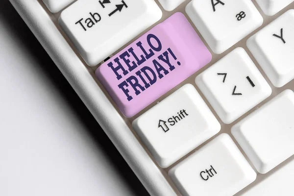 Word writing text Hello Friday. Business concept for you say this for wishing and hoping another good lovely week White pc keyboard with empty note paper above white background key copy space.