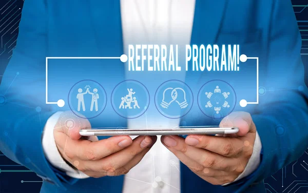 Text sign showing Referral Program. Conceptual photo internal recruitment method employed by organizations Male human wear formal work suit presenting presentation using smart device. — Stock Photo, Image