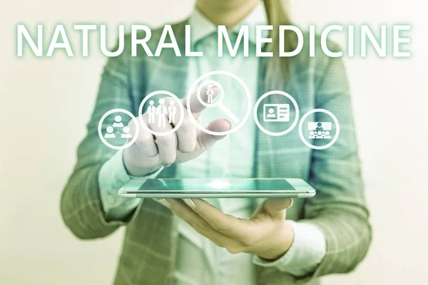 Conceptual hand writing showing Natural Medicine. Business photo text any of various systems of healing or treating disease Lady front presenting hand blue glow futuristic modern technology.