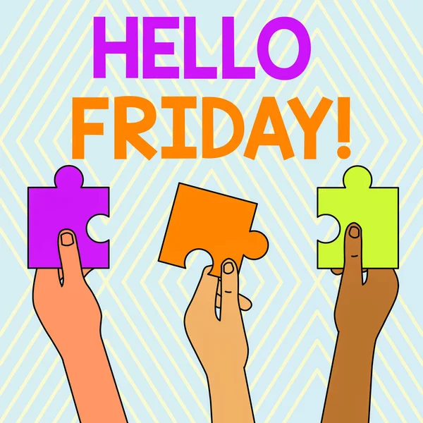 Text sign showing Hello Friday. Conceptual photo used to express happiness from beginning of fresh week Three Colored Empty Jigsaw Puzzle Pieces Held in Different People Hands.