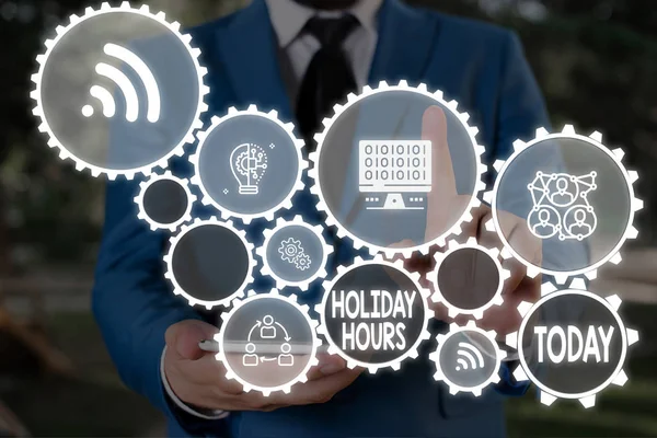 Textschild mit den Feiertagszeiten. konzeptionelles Foto Mitarbeiter erhält das Doppelte ihres normalen Gehalts für alle Stunden männlichen Menschen tragen formale Arbeitsanzug präsentiert Präsentation mit Smart-Gerät. — Stockfoto