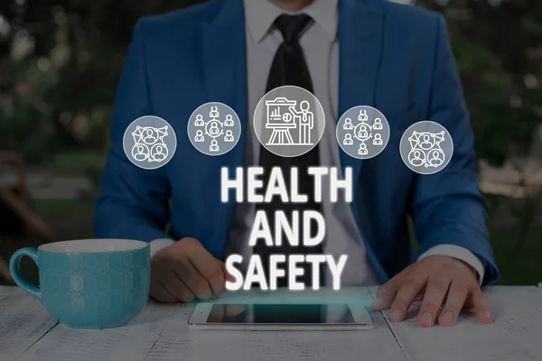 Sinal de texto mostrando Saúde e Segurança. Procedimentos fotográficos conceituais destinados a prevenir acidentes no local de trabalho . — Fotografia de Stock