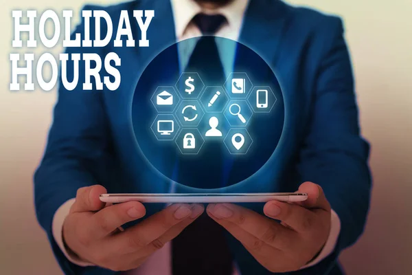 Writing note showing Holiday Hours. Business photo showcasing employee receives twice their normal pay for all hours. — Stock Photo, Image