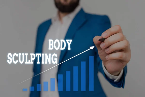 Text sign showing Body Sculpting. Conceptual photo activity of increasing the body s is visible muscle tone Male human wear formal work suit presenting presentation using smart device.