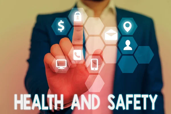 Woord tekst schrijven gezondheid en veiligheid. Bedrijfsconcept voor procedures ter voorkoming van ongevallen op de werkplek. — Stockfoto