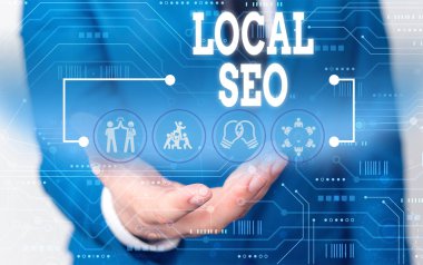 Handwriting text writing Local Seo. Concept meaning helps businesses promote products and services to local customers Male human wear formal work suit presenting presentation using smart device.