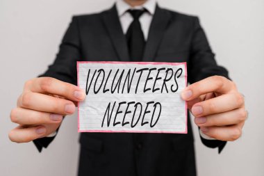 Text sign showing Volunteers Needed. Conceptual photo need work or help for organization without being paid. clipart