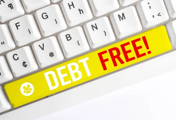 Word writing text Debt Free. Business concept for does not owning any money or things to any individual or companies White pc keyboard with empty note paper above white background key copy space.