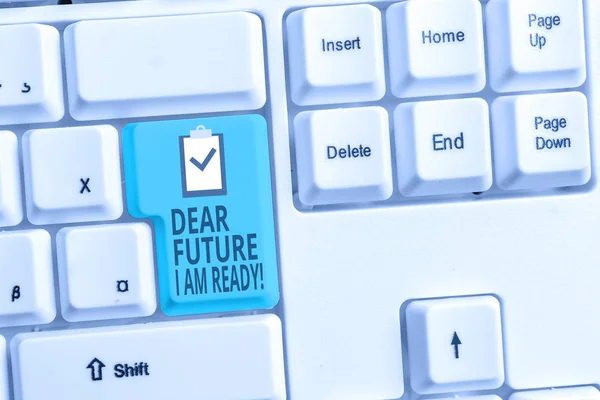 Handwriting text writing Dear Future I Am Ready. Concept meaning state action situation being fully prepared White pc keyboard with empty note paper above white background key copy space.