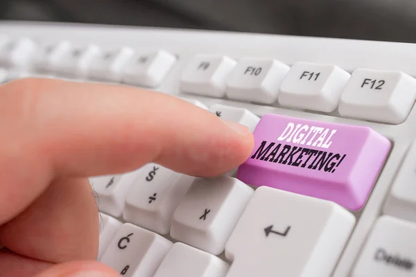 Text sign showing Digital Marketing. Conceptual photo market products or services using technologies on Internet White pc keyboard with empty note paper above white background key copy space.