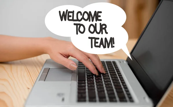 Writing note showing Welcome To Our Team. Business photo showcasing introducing another demonstrating to your team mates woman with laptop smartphone and office supplies technology.